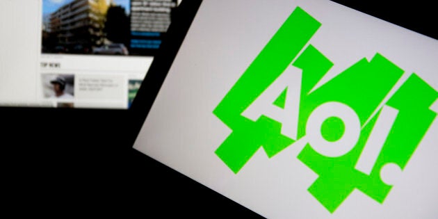 The Aol.com website and Aol Inc. logo are displayed on laptop computers arranged for a photograph in Washington, D.C., U.S., on Monday, Nov. 4, 2013. Aol Inc. is expected to release earnings data on Nov. 5. Photographer: Andrew Harrer/Bloomberg via Getty Images