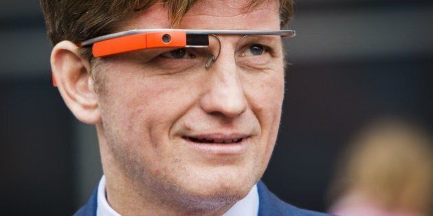 Dutch Prince Pieter Christiaan wears Google Glasses during the King's Day celebrations in Amstelveen, The Netherlands, on April 26, 2014. Hundreds of thousands of orange-clad Dutch lined the streets on Saturday as the Netherlands celebrated its first-ever 'King's Day' in honour of Willem-Alexander, inaugurated one year ago. AFP PHOTO / ANP POOL / FREEK VAN DEN BERGH ==Netherlands out== (Photo credit should read Freek van den Bergh/AFP/Getty Images)