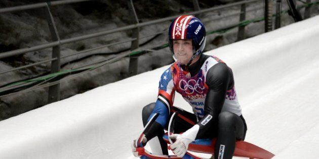 The USA's Tucker West (25) completes his run in the second heat of the the men's single luge competition at the Sanki Sliding Centre during the Winter Olympics in Sochi, Russia, Saturday, Feb. 8, 2014. (Chuck Myers/MCT via Getty Images)