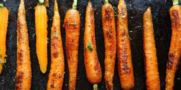 baked carrots on a baking sheet ...