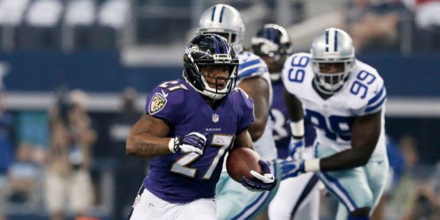 In this Aug. 16, 2014, photo, Baltimore Ravens running back Ray Rice (27) carries during an NFL preseason football game against the Dallas Cowboys in Arlington, Texas. Ravens running back Ray Rice is sitting out two games for domestic violence. A positive marijuana test, meanwhile, means Browns wide receiver Josh Gordon will miss a full year. (AP Photo/Brandon Wade)