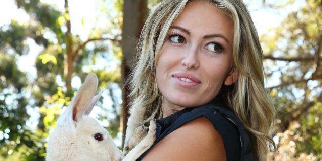 PERTH, AUSTRALIA - OCTOBER 18: Paulina Gretzky, partner of Dustin Johnson of the USA nurses a Joey during day two of the Perth International at Lake Karrinyup Country Club on October 18, 2013 in Perth, Australia. (Photo by Matt King/Getty Images)