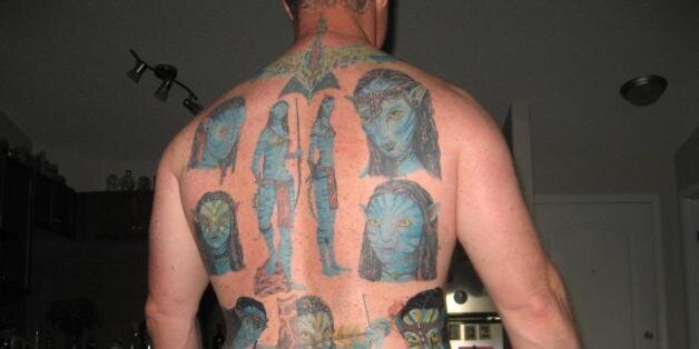 Weight Avatar fans all over his back Tattoo  My Blog