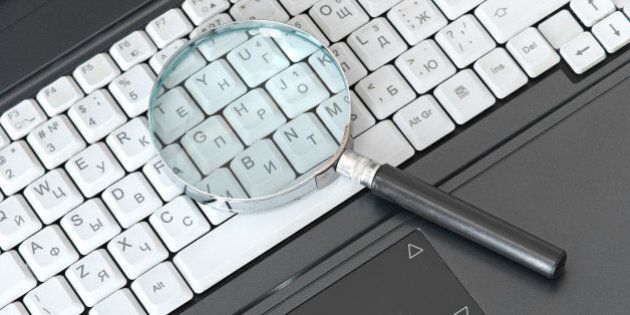 laptop with a magnify glass...