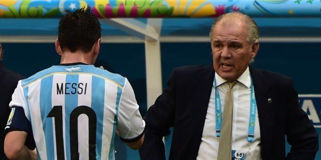 Argentina's forward Lionel Messi (L) walks towards Argentina's coach Alejandro Sabella during a quarter-final football match between Argentina and Belgium at the Mane Garrincha National Stadium in Brasilia during the 2014 FIFA World Cup on July 5, 2014. AFP PHOTO / FRANCOIS XAVIER MARIT (Photo credit should read FRANCOIS XAVIER MARIT/AFP/Getty Images)