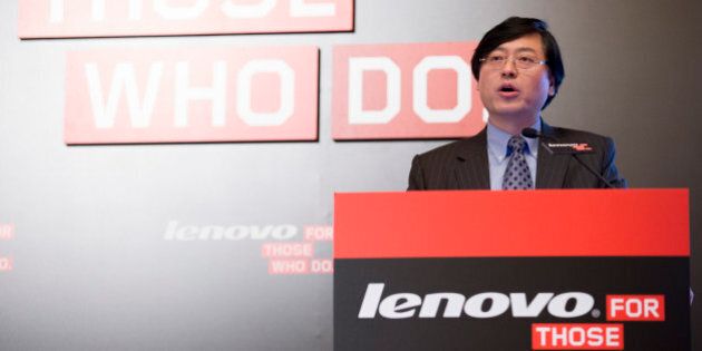 Yang Yuanqing, chairman and chief executive officer of Lenovo Group Ltd., speaks during a news conference in Hong Kong, China, on Wednesday, May 21, 2014. Lenovo, the world's largest maker of personal computers, reported a 25 percent jump in fourth-quarter profit as its desktop models and mobile devices gained global market share. Photographer: Brent Lewin/Bloomberg via Getty Images