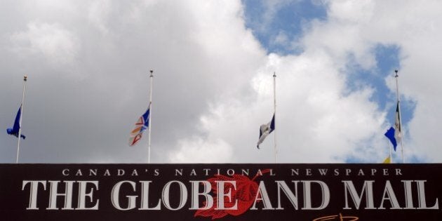 TORONTO - JUNE 13: Flags fly at half mast on the Globe and Mail newspaper headquarters in downtown on June 13, 2006 in Toronto, Ontario, Canada. The Globe and Mail's media mogul proprietor, Kenneth Thomson, former chairman of Thomson Corporation, famous collector of art, and one of the world's richest men, died in his Toronto office on Monday at the age of 82. (Photo by Simon Hayter/Getty Images)