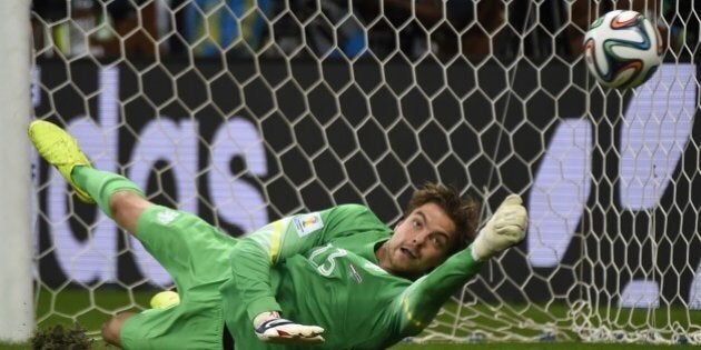 Netherlands' goalkeeper Tim Krul saves a penalty during the penalty shoot-out of the quarter-final football match between the Netherlands and Costa Rica at the Fonte Nova Arena in Salvador during the 2014 FIFA World Cup on July 5, 2014. AFP PHOTO / ODD ANDERSEN (Photo credit should read ODD ANDERSEN/AFP/Getty Images)