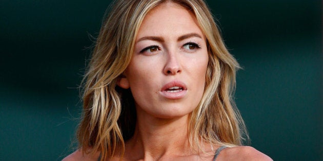 LAHAINA, HI - JANUARY 03: Paulina Gretzky watches the play of Dustin Johnson during round one of the Hyundai Tournament of Champions at the Plantation Course at Kapalua Golf Club on January 3, 2014 in Lahaina, Hawaii. (Photo by Tom Pennington/Getty Images)