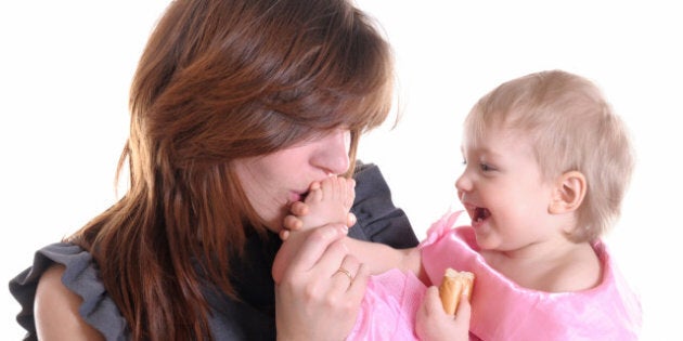 mother holding sweet baby girl