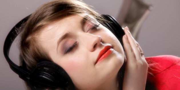 closeup girl with headphones...