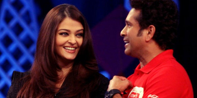 Indian Bollywood actress Aishwarya Rai Bachchan (L) and Indian cricketer Sachin Tendulkar participates in the Support My School telethon in Mumbai on February 3, 2013. AFP PHOTO (Photo credit should read STRDEL/AFP/Getty Images)