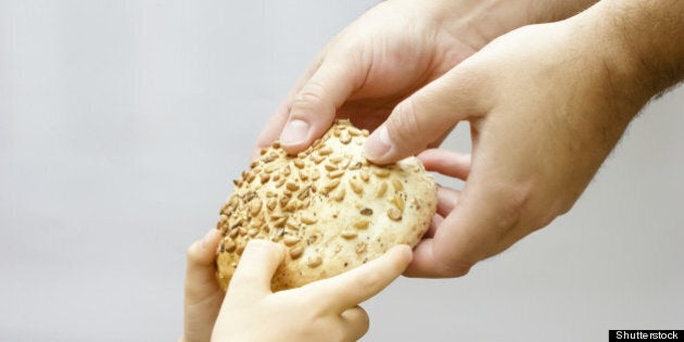 sharing bread. man giving bread ...