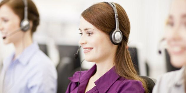 Businesswomen working in headsets