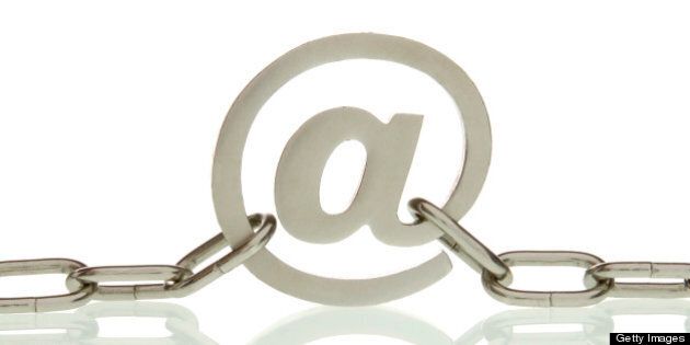 At-sign on the chain, symbolic image for internet censorship
