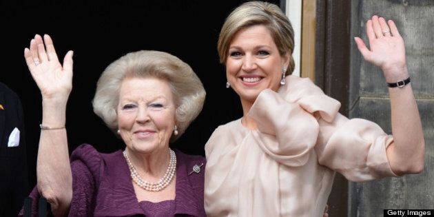 AMSTERDAM, NETHERLANDS - APRIL 30: Princess Beatrix of the Netherlands (L) and Queen Maxima (R) appear on the balcony of the Royal Palace to greet the public after her abdication and ahead of the Inauguration of King Willem Alexander of The Netherlands on April 30, 2013 in Amsterdam, Netherlands. (Photo by Pascal Le Segretain/Getty Images)