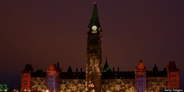 House of Commons, parliament building, lit up for Christmas, Ottawa, Ontario, Canada.