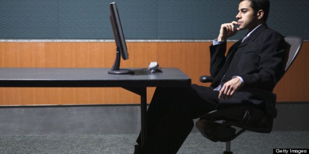 Pensive businessman in office