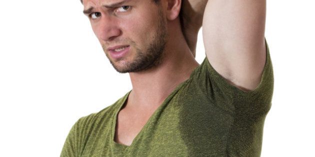 man with hyperhidrosis sweating ...