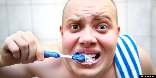 funny man furiously brushing...