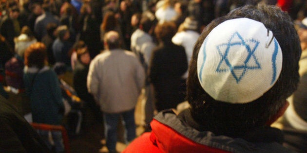 TORONTO, CANADA - MARCH 24: Some 2,000 people attend a rally to support religious tolerance after a series of recent anti-semitic attacks struck synagogues and homes March 24, 2004 at the Lipa Green Centre in Toronto, Canada. (Photo by Donald Weber/Getty Images)