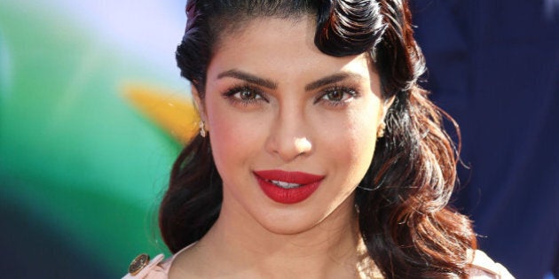 HOLLYWOOD, CA - AUGUST 05: Actress Priyanka Chopra attends the premiere of Disney's 'Planes' at the El Capitan Theatre on August 5, 2013 in Hollywood, California. (Photo by Imeh Akpanudosen/Getty Images)