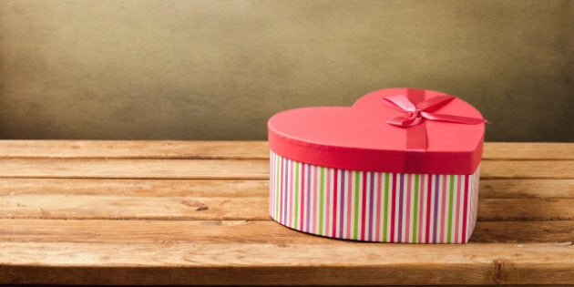 heart shape gift box on wooden...