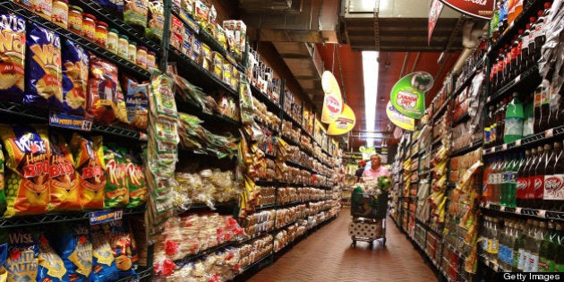 NEW YORK - AUGUST 14: A woman shops at a Fairway grocery store August 14, 2008 in the Brooklyn borough of New York City. A new government report has shown that U.S. inflation has risen to a 17-year-high annual rate in July, led by gains in energy, food, airline fares and apparel. Consumer prices rose by 0.8 per cent in July, which means that the cost of living in America is rising at a rate of 5.6 per cent over the year as a whole. (Photo by Spencer Platt/Getty Images)