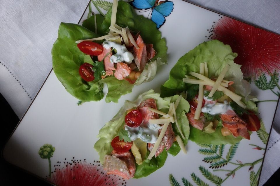 Lettuce cups with baked trout and cucumber yogurt drizzle