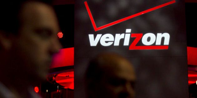 The Verizon Communications Inc. logo is seen at the International Consumer Electronics Show (CES) in Las Vegas, Nevada, U.S., on Thursday, Jan. 12, 2012. The 2012 CES trade show, which runs through Jan 13, features more than 2,700 global technology companies presenting consumer tech products and is expected to draw over 140,000 attendees. Photographer: Andrew Harrer/Bloomberg via Getty Images
