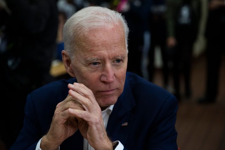 Former Vice President Joe Biden listens to voter in Los Angeles on Wednesday. The vice president is reportedly preparing a climate plan that he believes can appeal to blue-collar Trump voters.