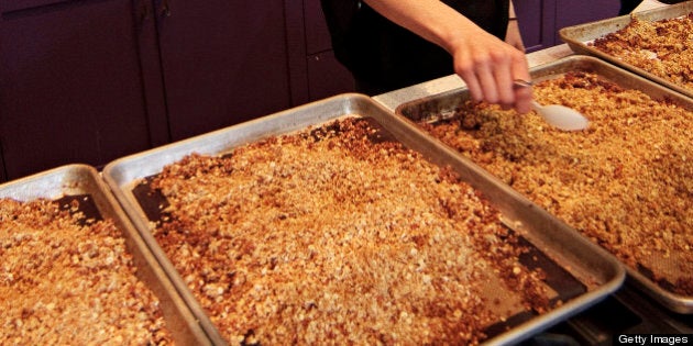 Chef Dani Fontaine spreads out cannabis-infused, gluten-free trail mix during a cannabis cooking class in Denver, Colorado, on Thursday, April 18, 2013. Participants also cooked up a cannabis-infused quinoa during the class. According to organizers, the food infused with cannabis results in a greater and more-consistant THC effect. The class was one of three offered during World Cannabis Week. (Werner R. Slocum/MCT via Getty Images)