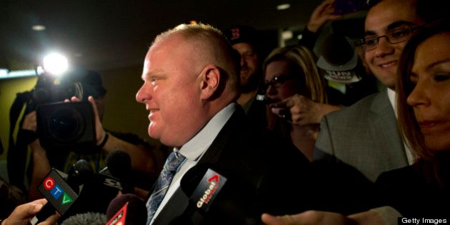 TORONTO, ON - MAY 28: Toronto Mayor Rob Ford arrived at City Hall Tuesday morning. Mayor Rob Ford faced reporters Monday after his press secretary, George Christopoulos, and deputy press secretary, Isaac Ransom, resigned amid a crack video scandal gripping Ford's office. On Tuesday morning Toronto Mayor Rob Ford was questioned whether or not his staffers attempted to obtain the video that allegedly shows him smoking crack. (Lucas Oleniuk/Toronto Star via Getty Images)