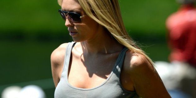 Paulina Gretzky, girlfriend of Dustin Johnson of the US and the daugter of hockey legend Wayne Gretzky during the Par 3 Contest held the day before the start of the 77th Masters golf tournament at Augusta National Golf Club on April 10, 2013 in Augusta, Georgia. AFP PHOTO / DON EMMERT (Photo credit should read DON EMMERT/AFP/Getty Images)