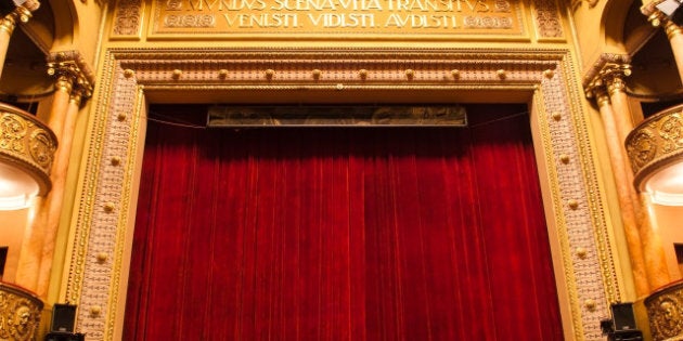 theater stage with red curtain