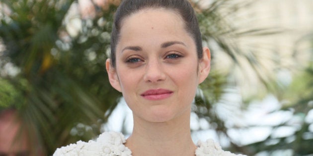 CANNES, FRANCE - MAY 24: Marion Cotillard attends the photocall for 'The Immigrant' at The 66th Annual Cannes Film Festival on May 24, 2013 in Cannes, France. (Photo by Tony Barson/FilmMagic)