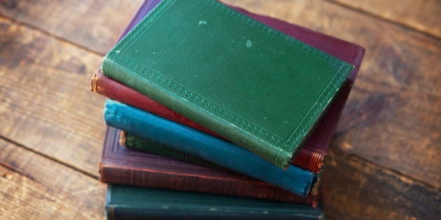 old books on white old wooden...