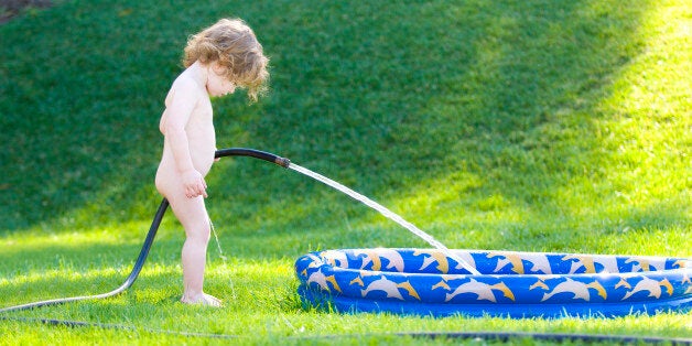 Girl peeing grass 