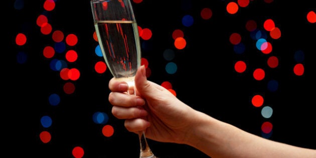 woman hand with glass of...