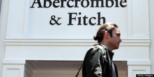 SAN FRANCISCO, CA - MAY 24: A man walks by an Abercrombie and Fitch store on May 24, 2013 in San Francisco, California. Teen apparel retailer Abercrombie and Fitch Co. reported an 8.9 percent decline in first quarter sales for a quarterly loss of $7.2 million, or nine cents a share comapred to a loss of $21.3 million, or 25 cents a share one year ago. (Photo by Justin Sullivan/Getty Images)