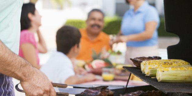 family enjoying a barbeque