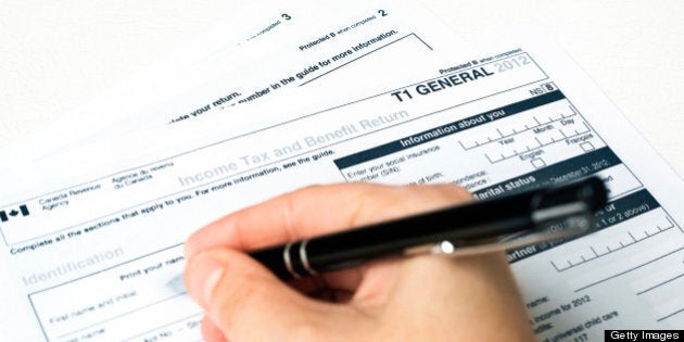 Filling out a 2012 Revenue Canada General T1 Tax Form.