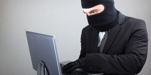 computer hacker in suit and tie