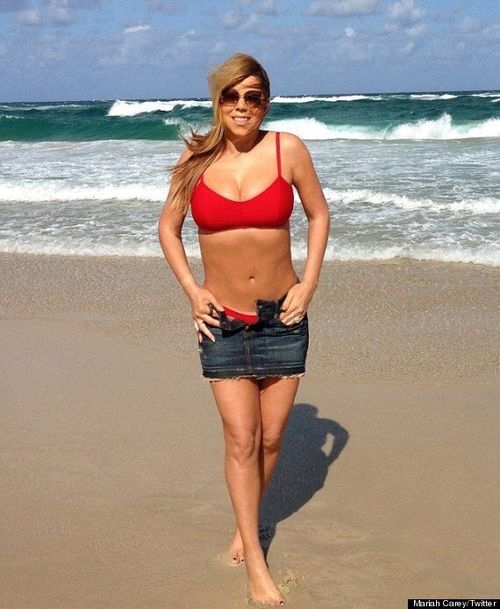 Mariah Carey Flaunts Fantastic Body And Rock Hard Abs In Red