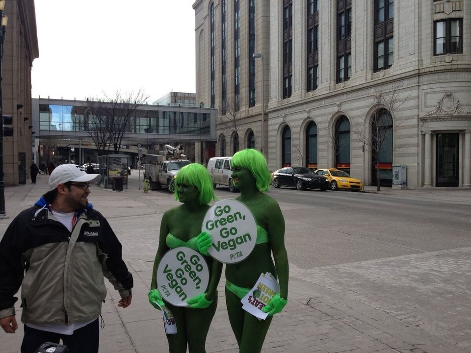 PETA Protest Calgary: Activists In Green Bikinis, Bodypaint On Stephen ...