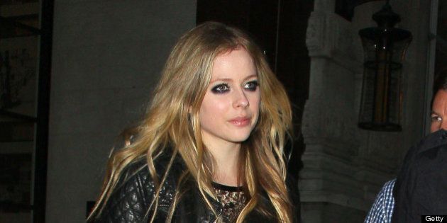 LONDON, UNITED KINGDOM - JUNE 05: Avril Lavigne leaving the Corinthia hotel on June 5, 2013 in London, England. (Photo by Mark Robert Milan/FilmMagic)