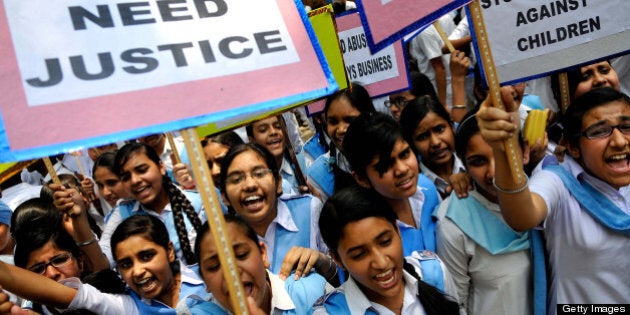 NEW DELHI, INDIA - APRIL 23: Sikh School children holding placards during thier protest against the brutal rape of a five year old girl at Jantar Mantar on April 23, 2013 in New Delhi, India. The child was abducted and raped in east Delhi's Gandhi Nagar on April 15 and was recovered after two days. She is undergoing treatment at AIIMS hospital. The incident enraged people, who took to the streets to protest against alleged laxity of police in this case. (photo by Arijit Sen/Hindustan Times via Getty Images)