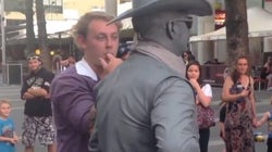 WATCH: Human Statue Punches Man And Other Top Viral