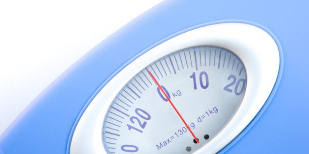 weight scale close up on white
