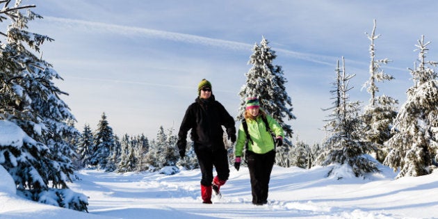 man and woman hikers walking in ...